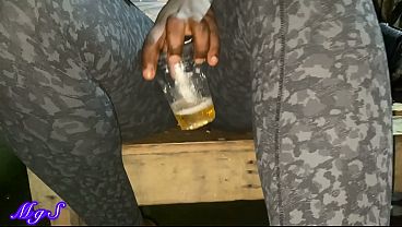 Young ebony milf flashes pussy at a roof top bar